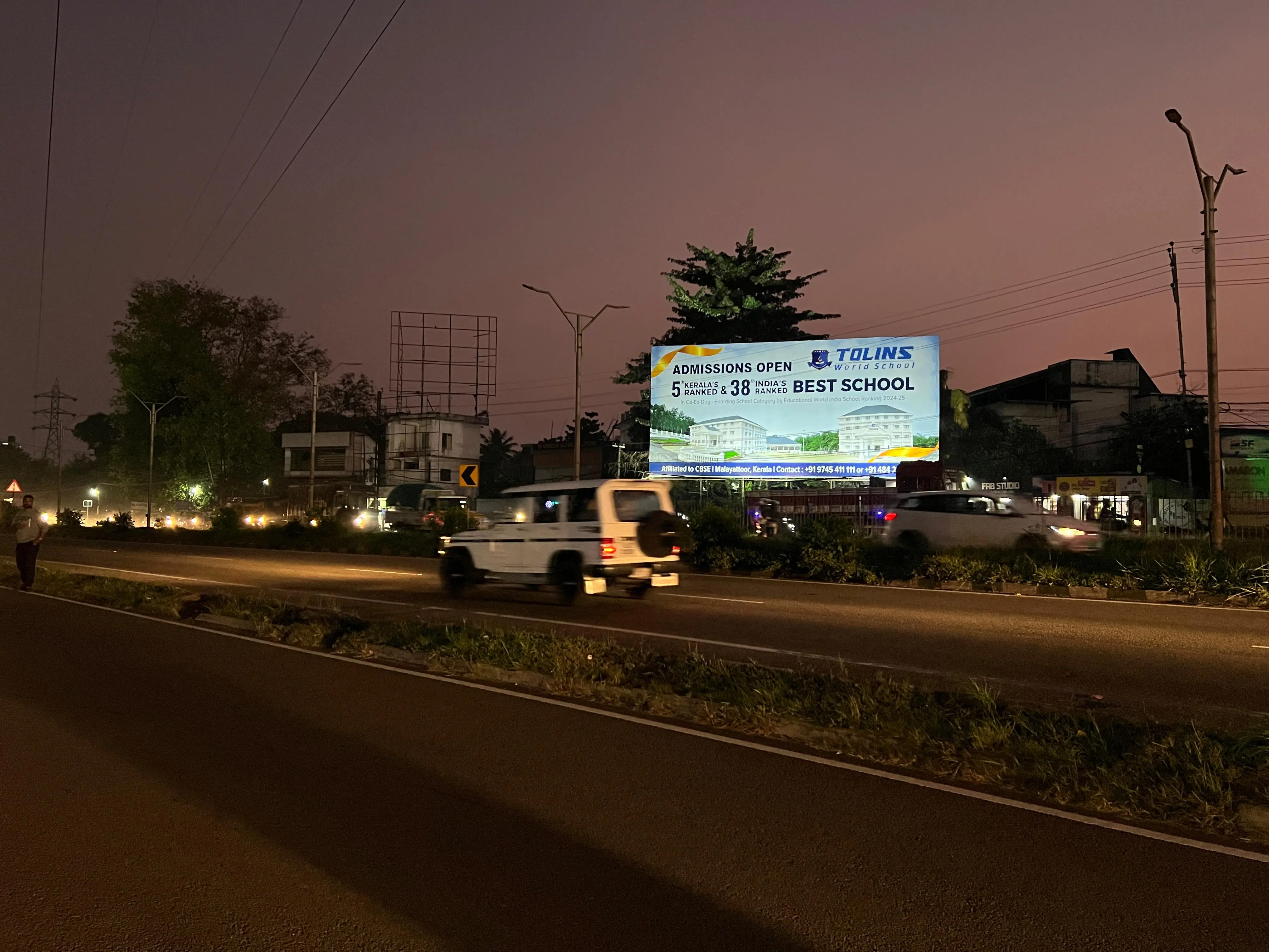Illuminated billboard at Aluva Thottakkattukara Junction