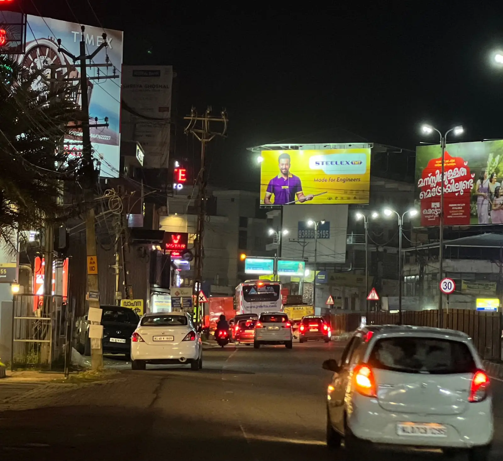 Illuminated Billboard at Angamaly Church Road Junction Towards Thrissur